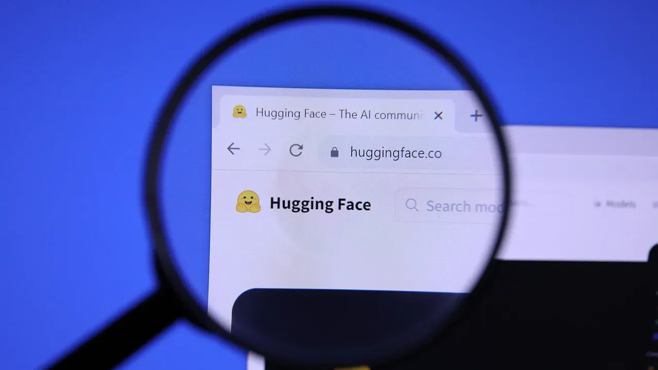 A magnifying glass held over the Hugging Face logo on the company's homepage.
