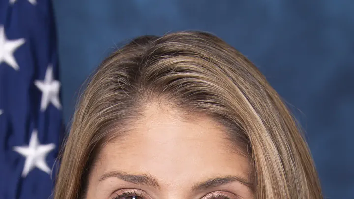 Official portrait of Rep. Lori Trahan from the 116th Congress, cropped to her head and shoulders. She wears a black blazer, and an American flag hangs behind her. The lead image is a 1280 by 720 WebP. Photo by the United States Congress, public domain, via Wikimedia Commons.